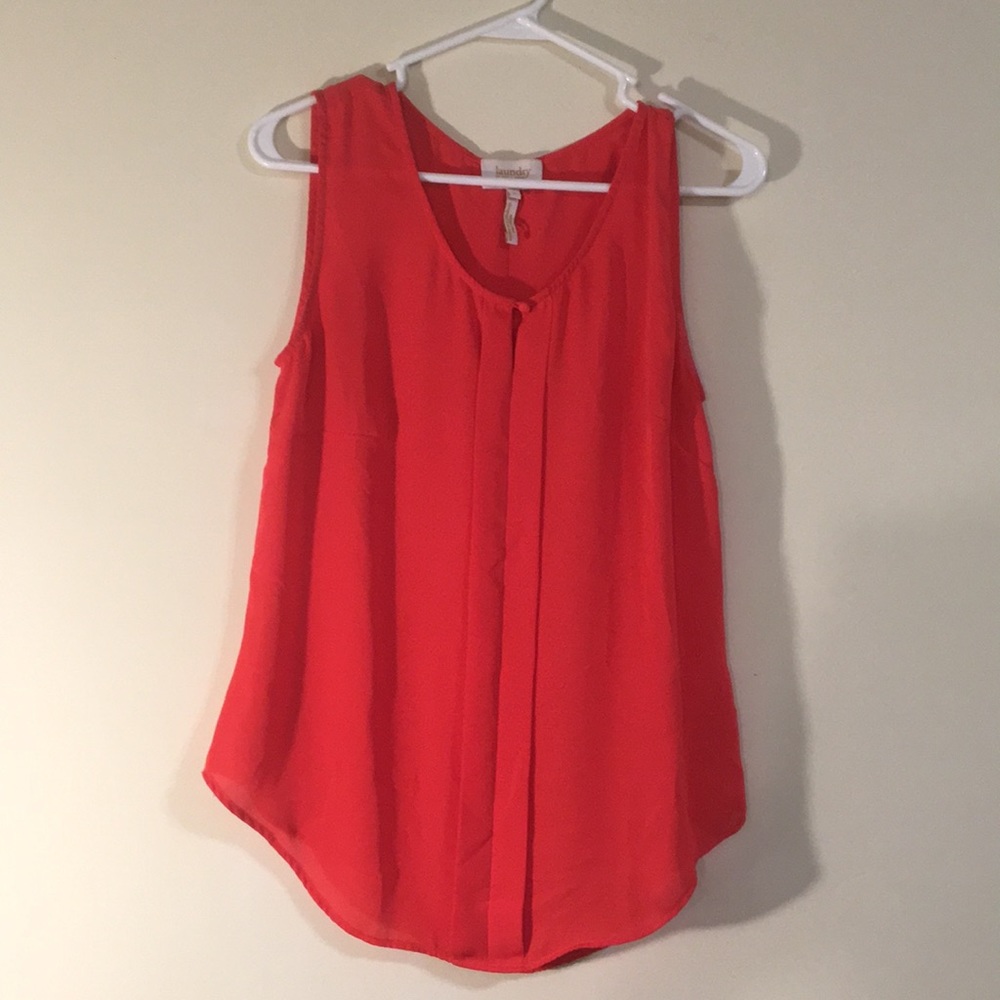 Red sleeveless blouse